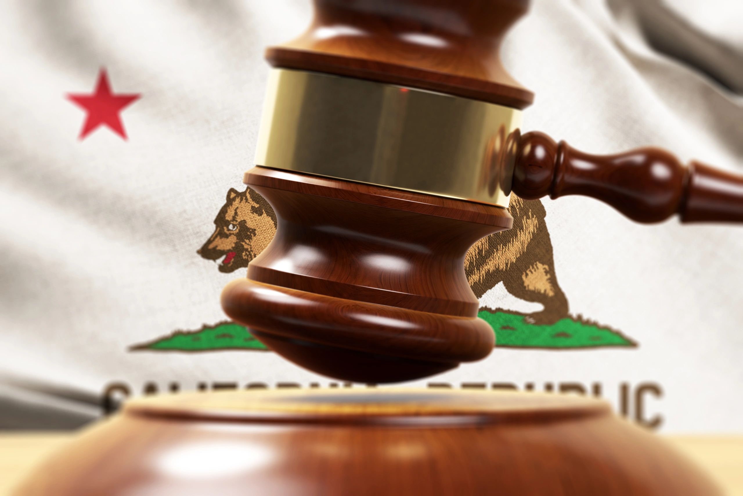 California gavel before state flag