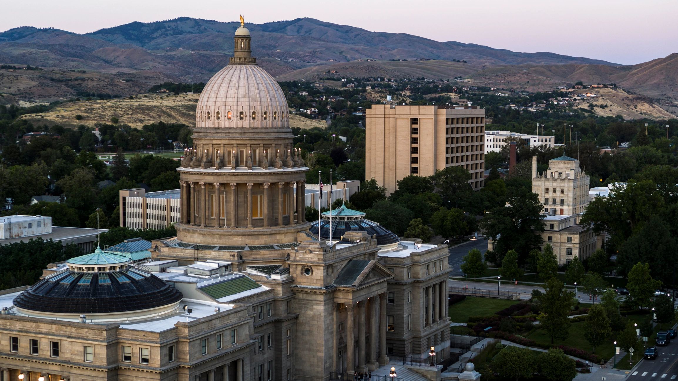 State Capitol Boise, Idaho. Foothills frame government headquarters at dusk.